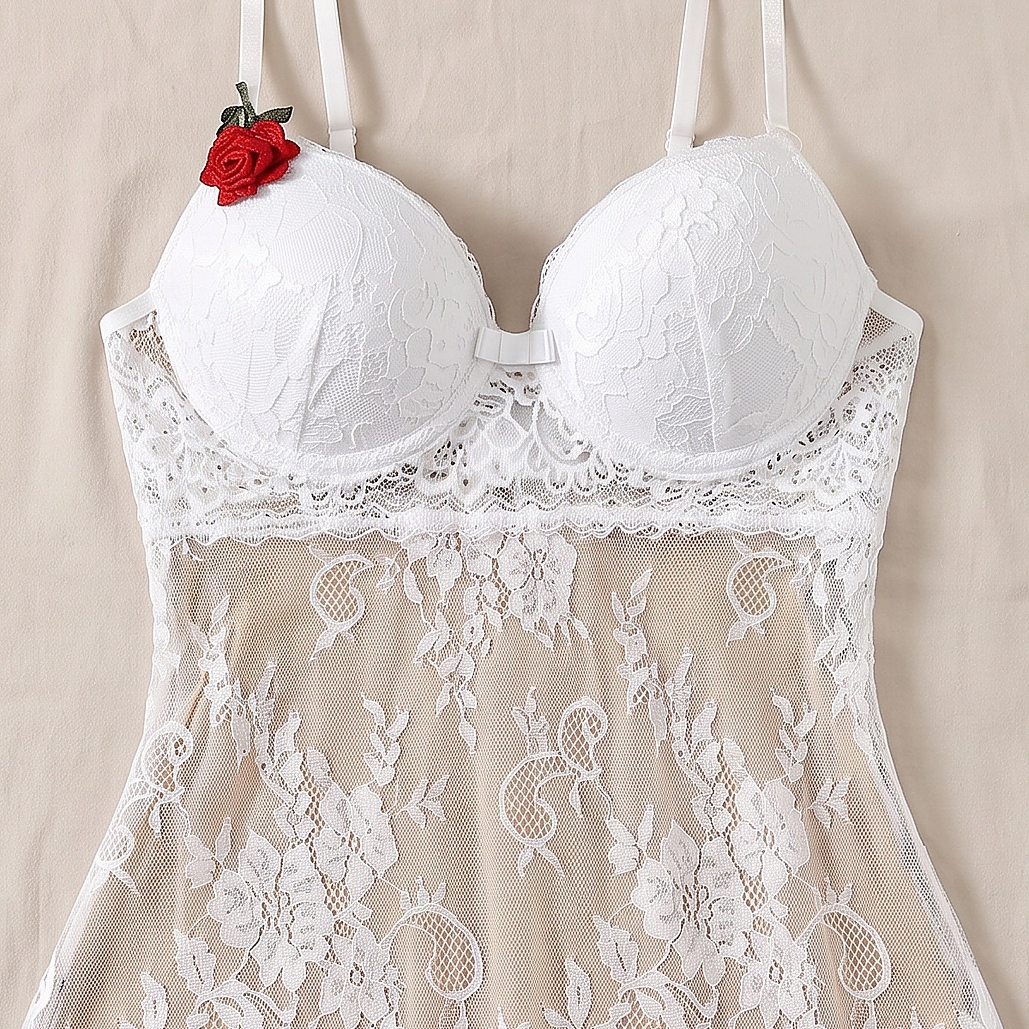 Détail du bustier à bonnets rembourrés en dentelle et de la rose décorative Image