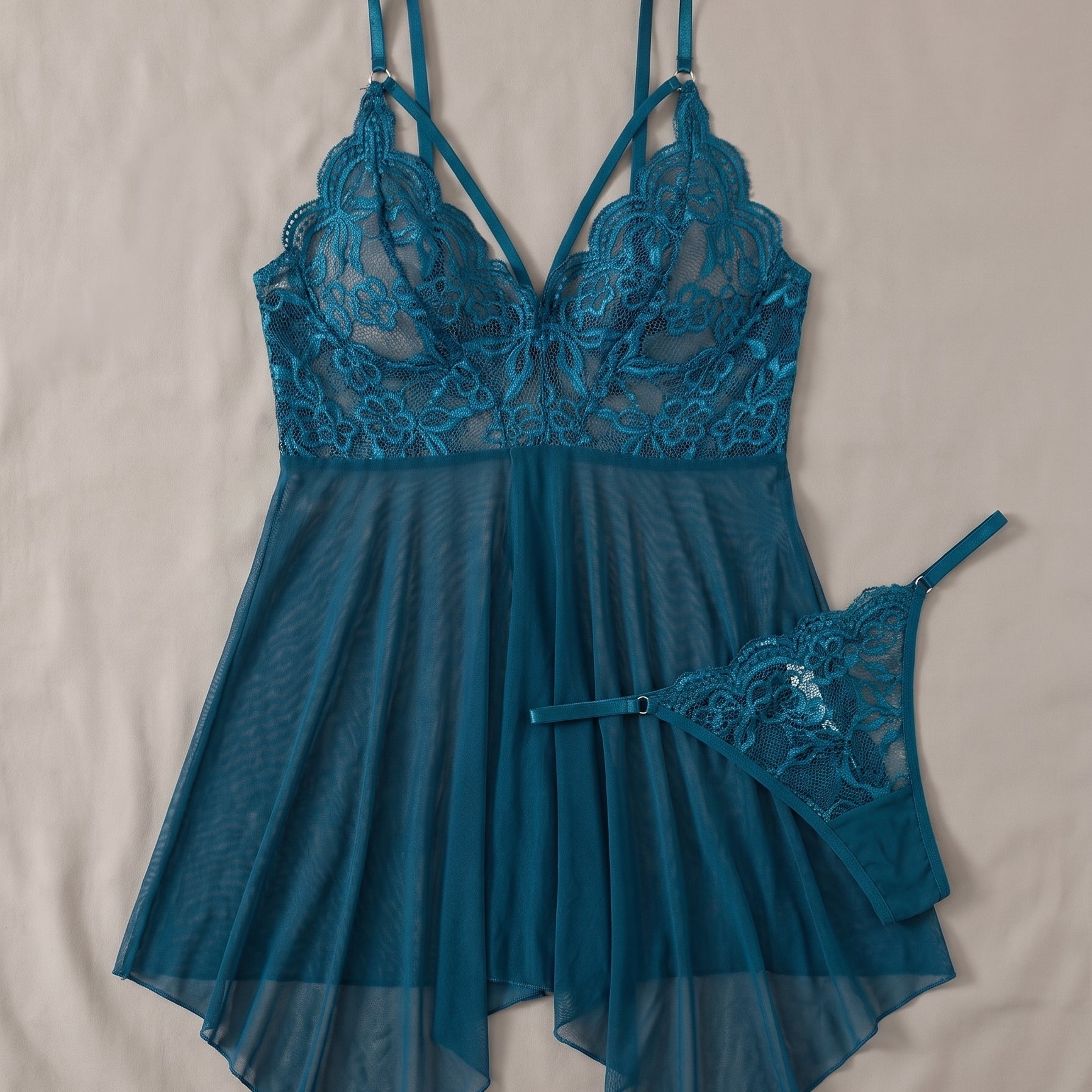 Le bleu canard, une sensualité magnétique — Nuisette Transparente Bleu Canard et son String Image