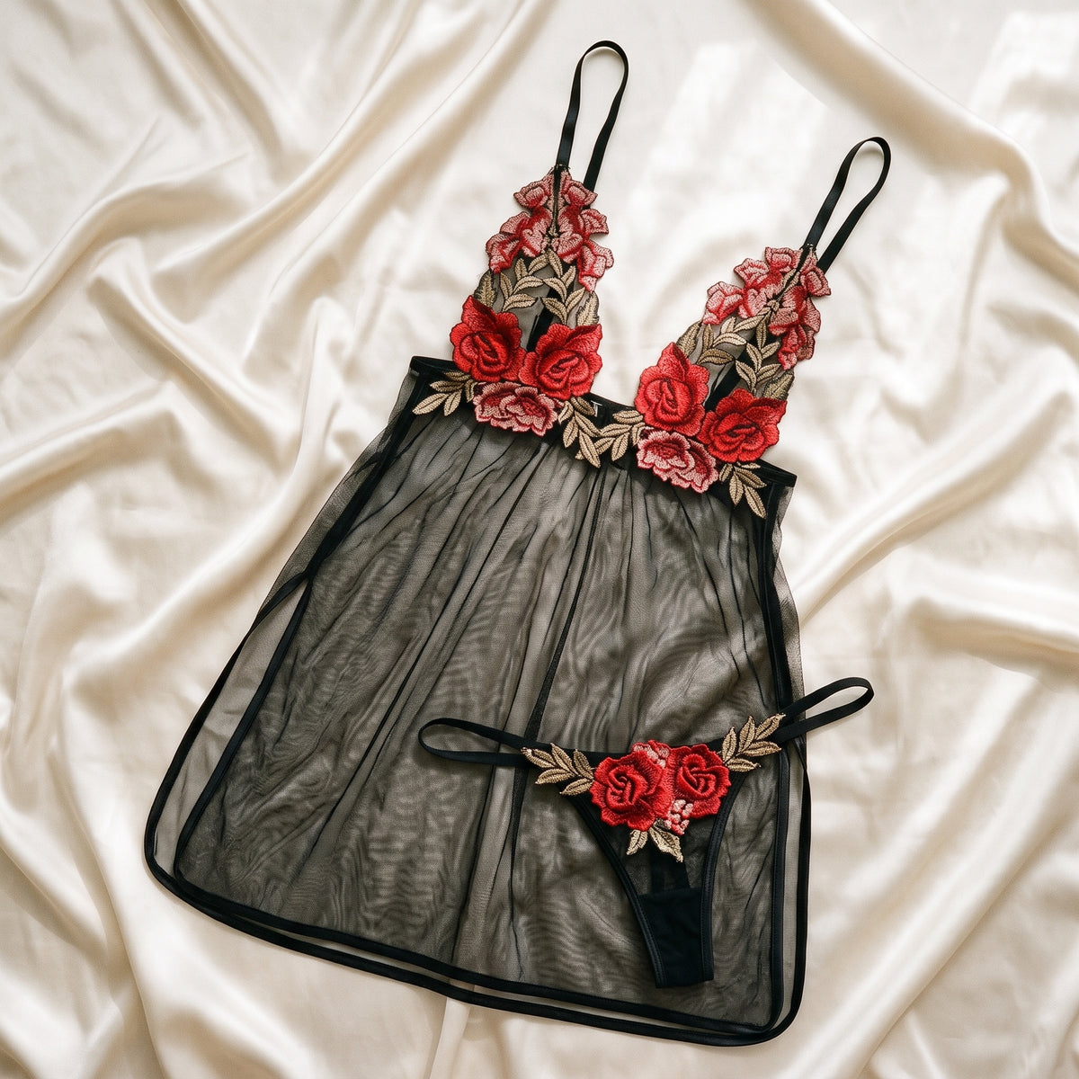 Nuisette noire à plat sur satin crème, détail du voile transparent