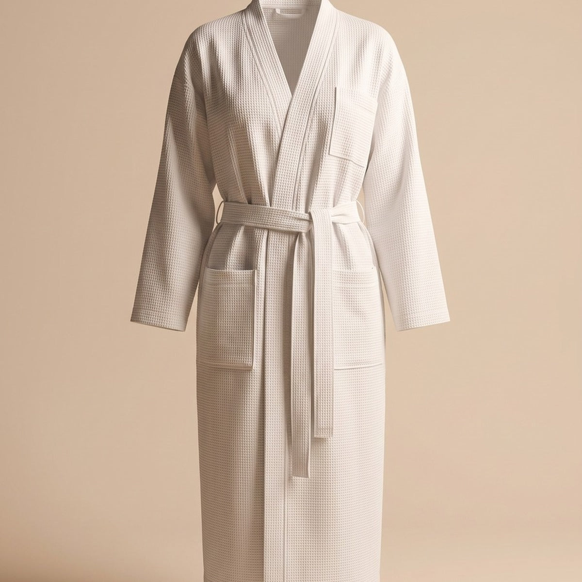 Détail des poches et de la ceinture du peignoir blanc en coton Image