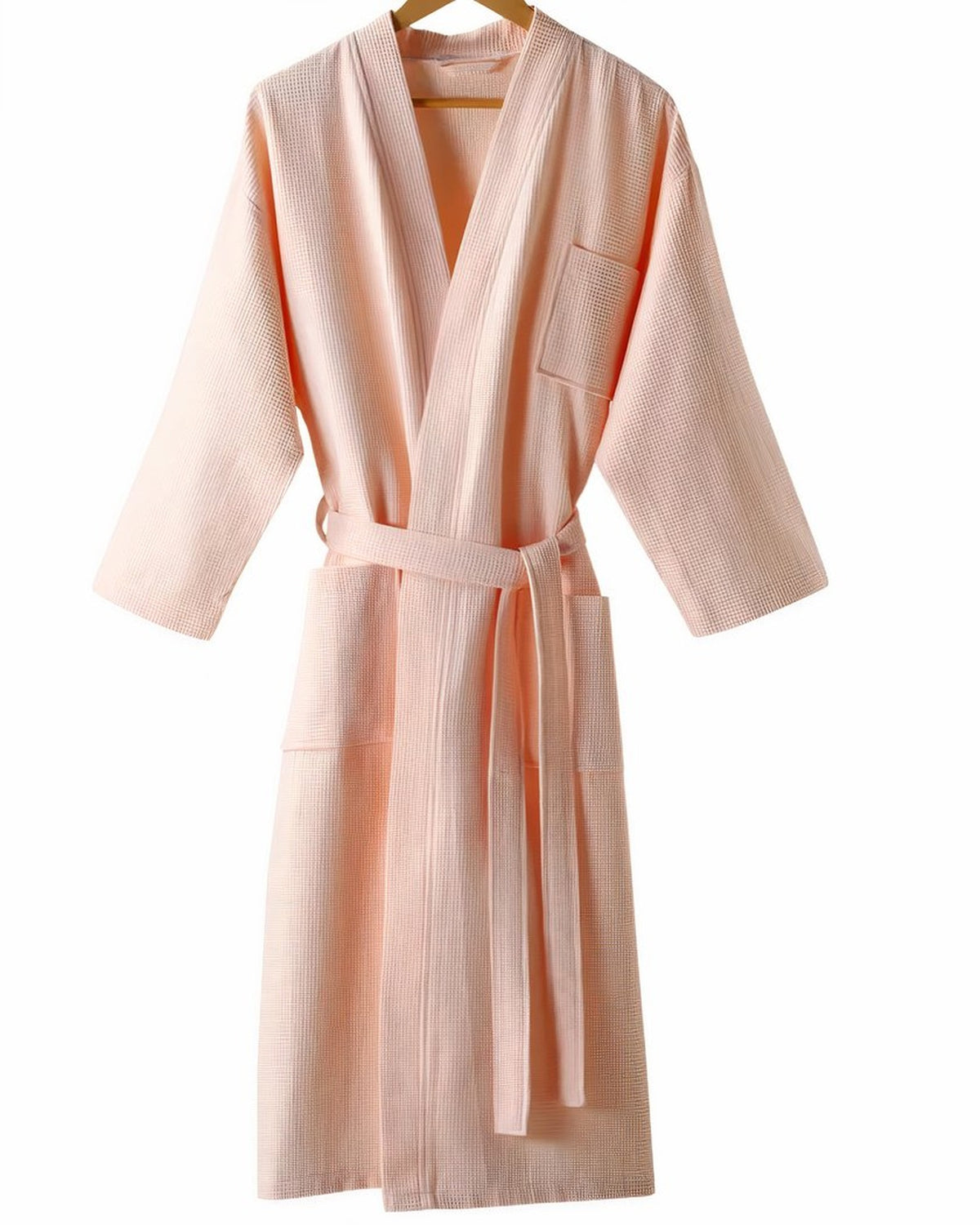Peignoir d'hôtel rose poudré en coton nid d'abeille, col kimono, ceinture et poches plaquées