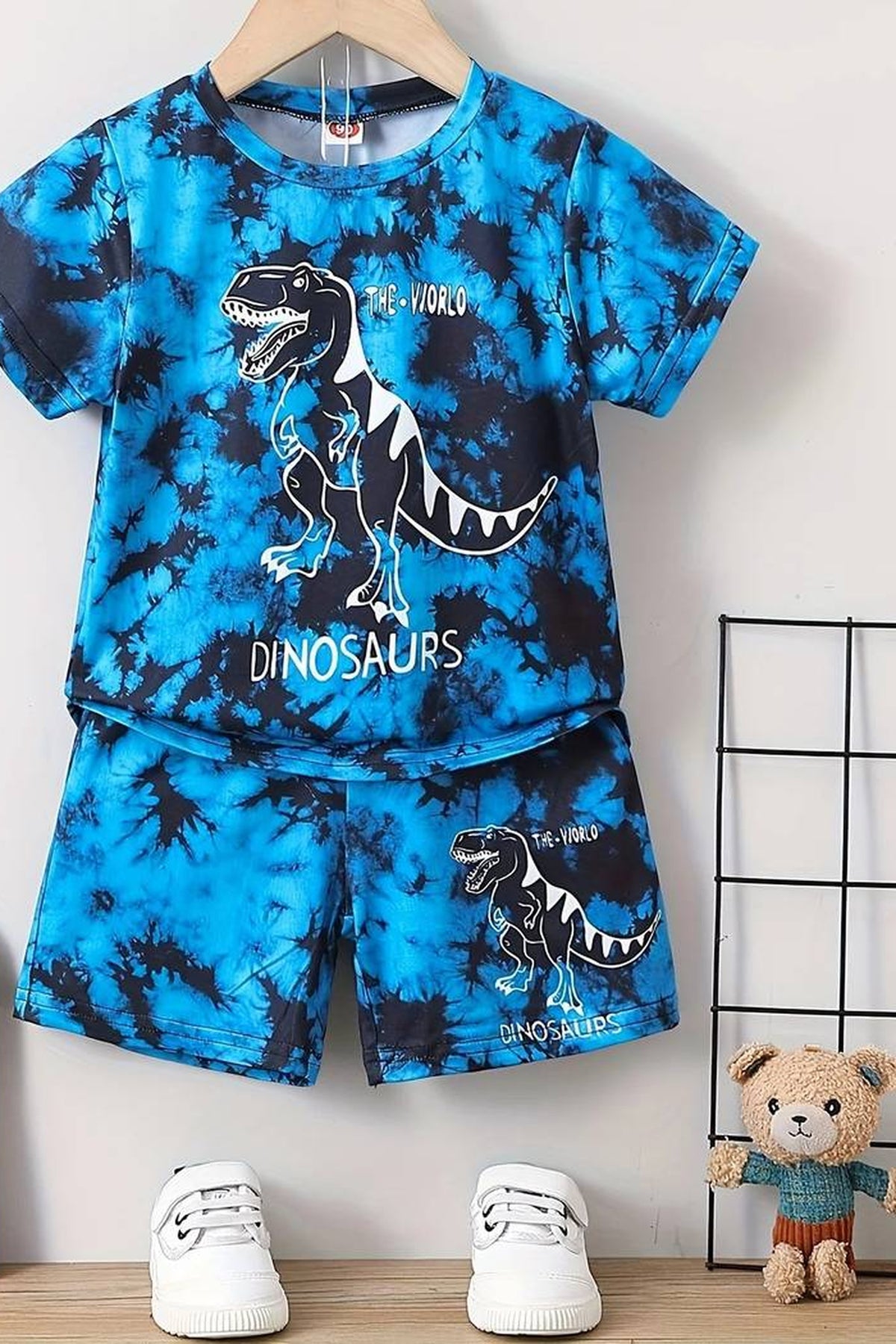 Pyjama garçon bleu tie-dye avec tyrannosaure au trait blanc, modèle 3