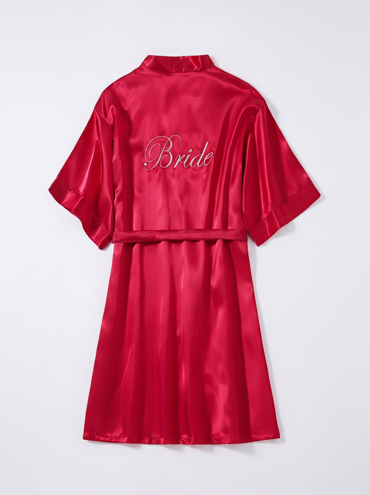 Dos du peignoir bride rouge avec inscription Bride brodee en lettres argentees